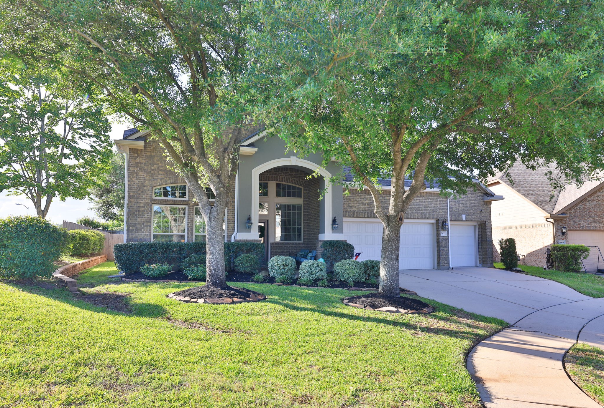5922 Glen Lief Court Spring, TX 77379 - Photo 2 of 41 a front view of a house with garden