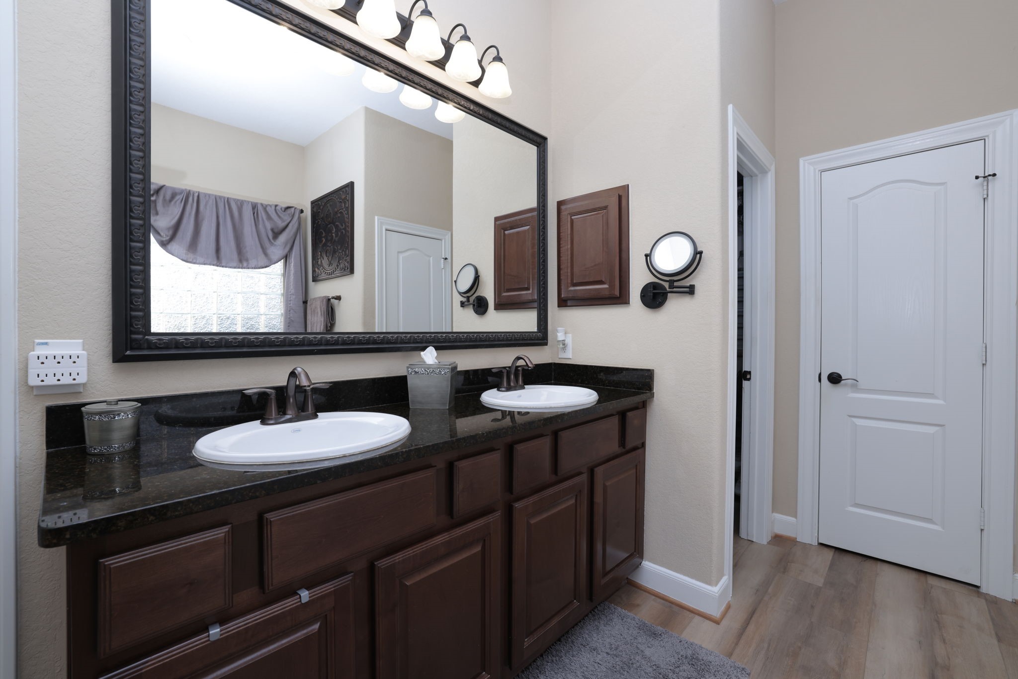 5922 Glen Lief Court Spring, TX 77379 - Photo 23 of 41 a bathroom with a sink and a mirror