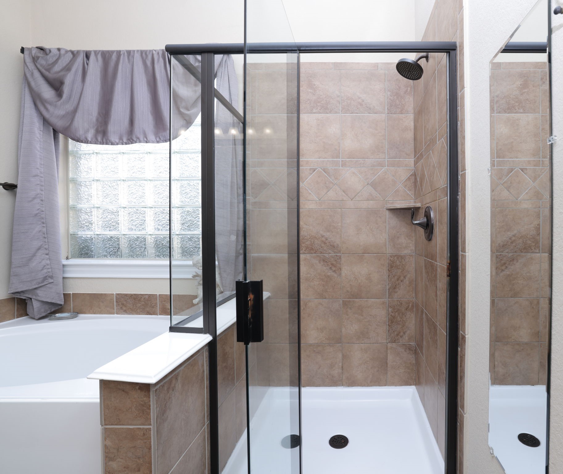 5922 Glen Lief Court Spring, TX 77379 - Photo 25 of 41 a bathroom with a sink and a shower