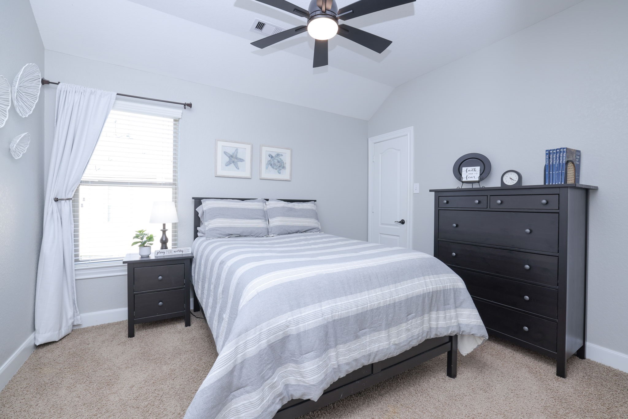 5922 Glen Lief Court Spring, TX 77379 - Photo 32 of 41 a bedroom with a bed and window