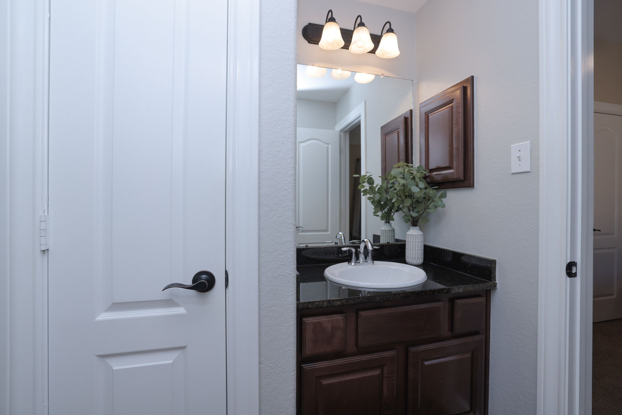 5922 Glen Lief Court Spring, TX 77379 - Photo 33 of 41 a bathroom with a sink and a mirror