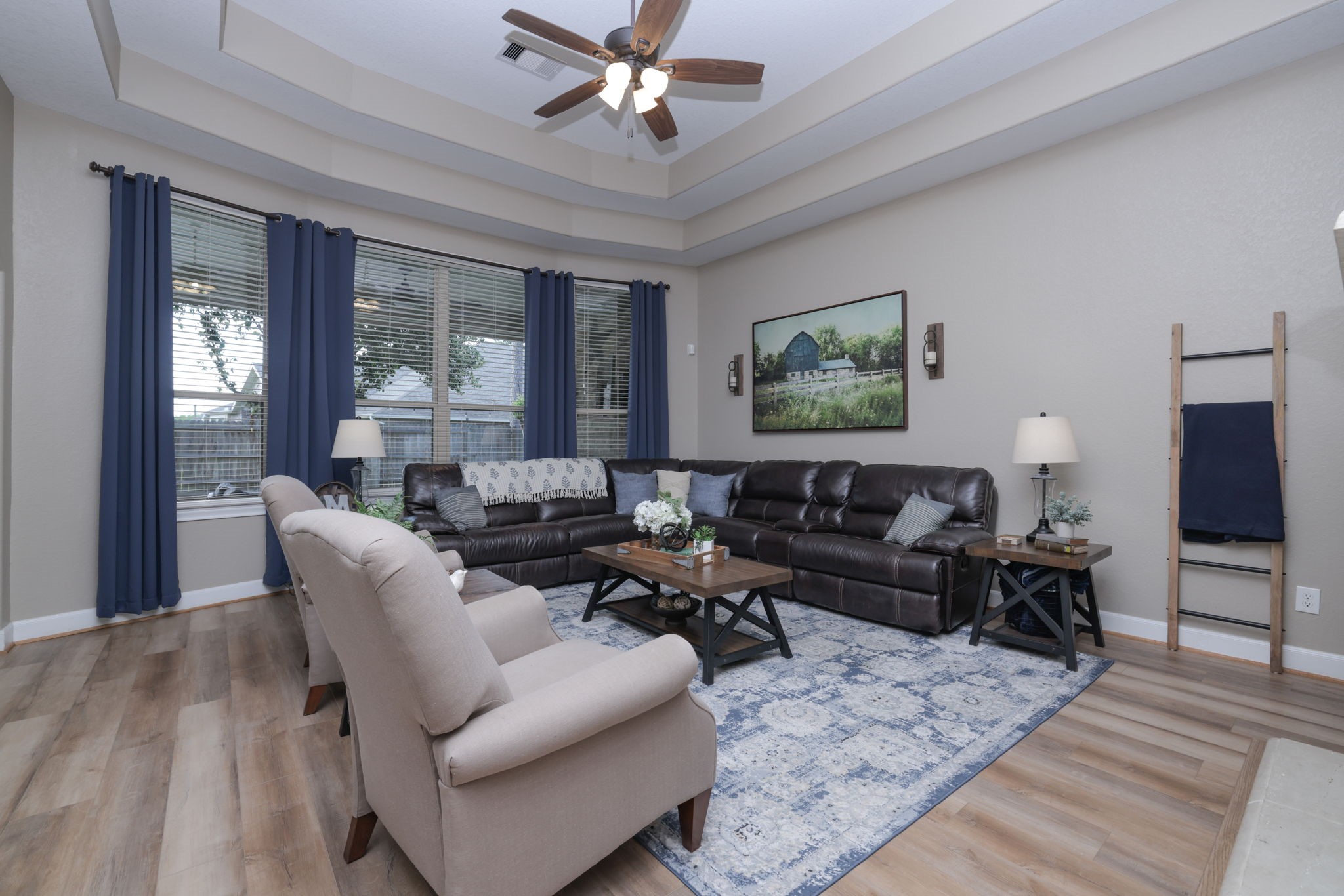 5922 Glen Lief Court Spring, TX 77379 - Photo 9 of 41 a living room with furniture a fireplace and a flat screen tv