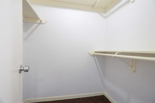 a view of a room with racks on the wall