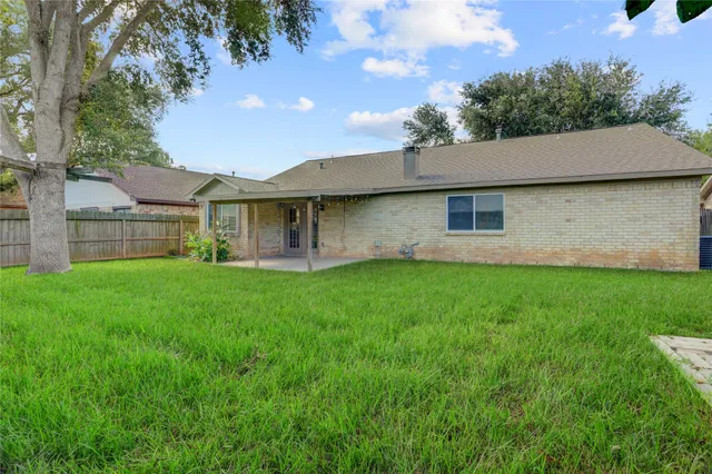 a view of a backyard with a garden