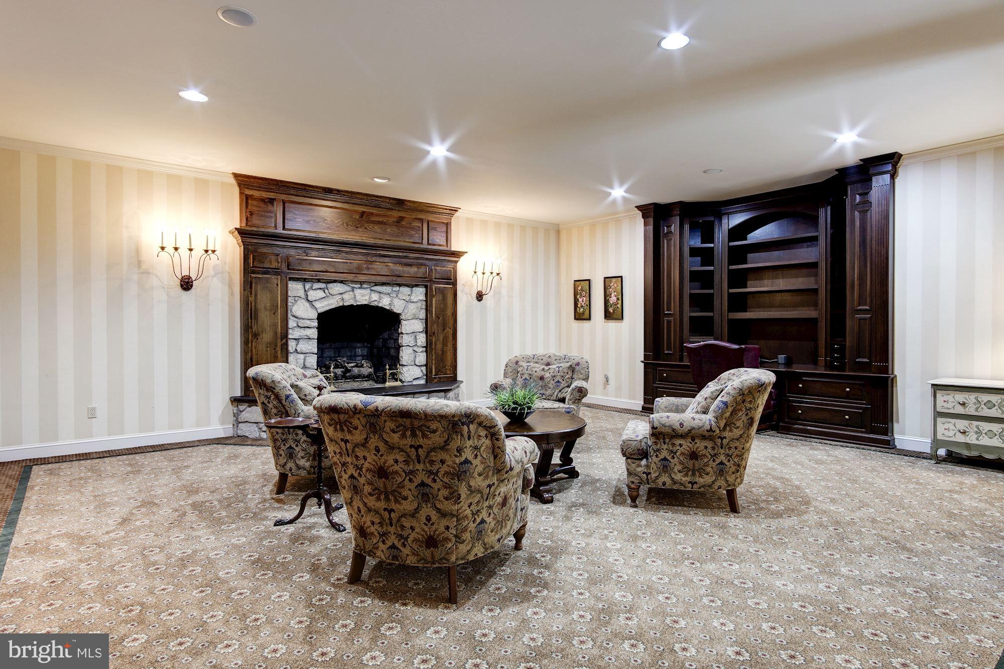 8715 Burdette Road Bethesda, MD 20817 - Photo 38 of 48 Lower Level Recreation Room with fireplace