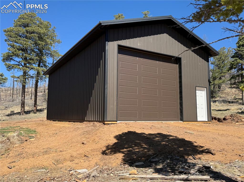 450 Schierl Road Fort Garland, CO 81133 - Photo 15 of 40 a black car parked in front of a house