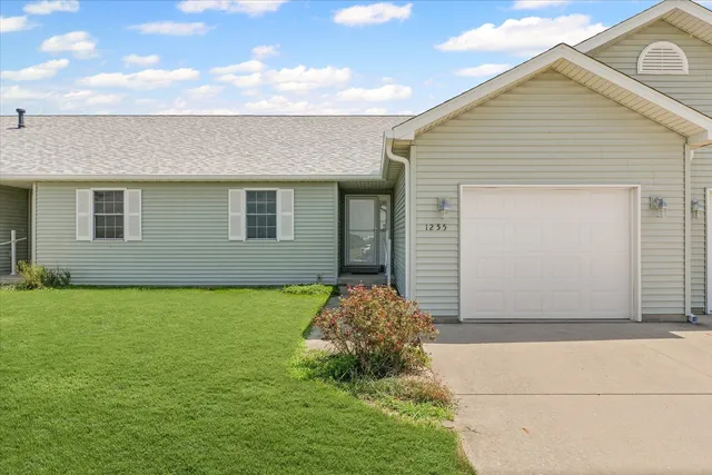 a front view of house with yard