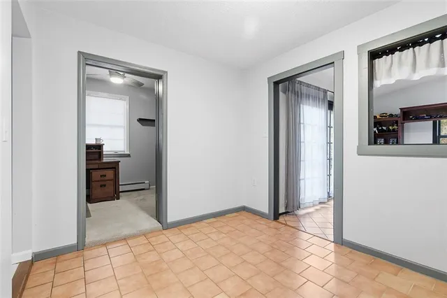 a view of a bedroom from the hallway