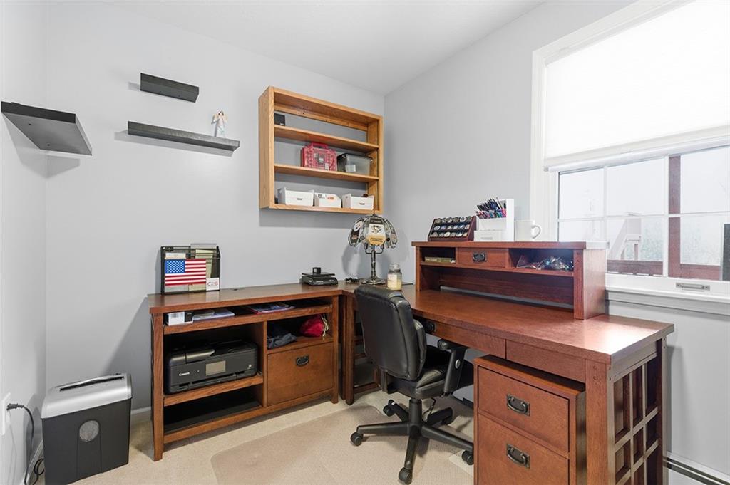 2034 Ewings Mill Road Coraopolis, PA 15108 - Photo 14 of 48 a view of a workspace with furniture and a window