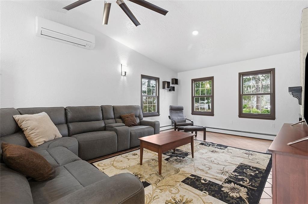 2034 Ewings Mill Road Coraopolis, PA 15108 - Photo 17 of 48 a living room with furniture and a window