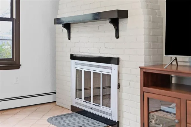 a kitchen with a sink and a window