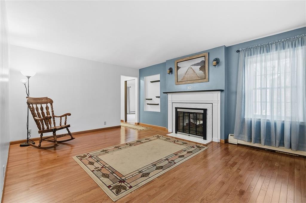 2034 Ewings Mill Road Coraopolis, PA 15108 - Photo 21 of 48 a living room with furniture and a fireplace