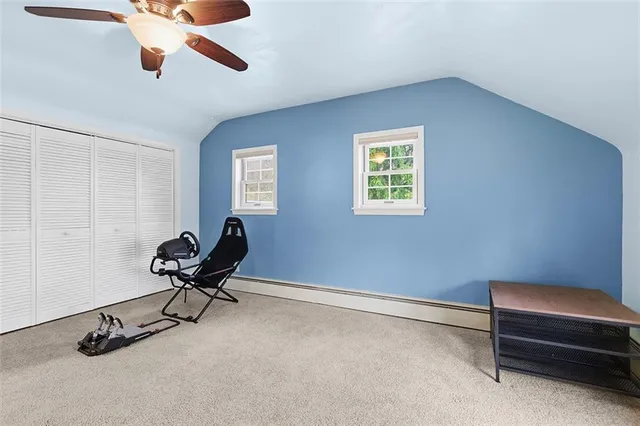 a work room with furniture and windows