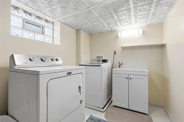 a utility room with dryer and washer