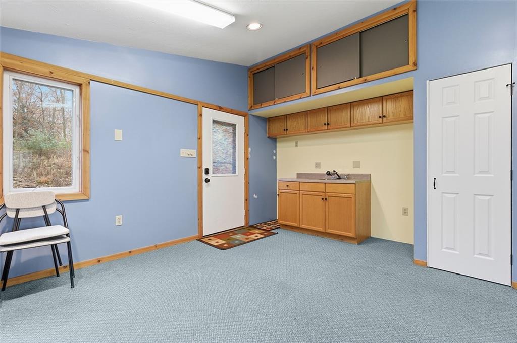 2034 Ewings Mill Road Coraopolis, PA 15108 - Photo 37 of 48 a view of a room with gym equipment and a window