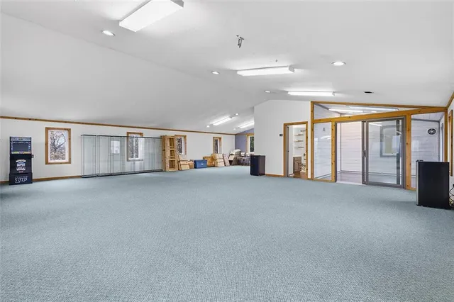 a view of a big room with large windows