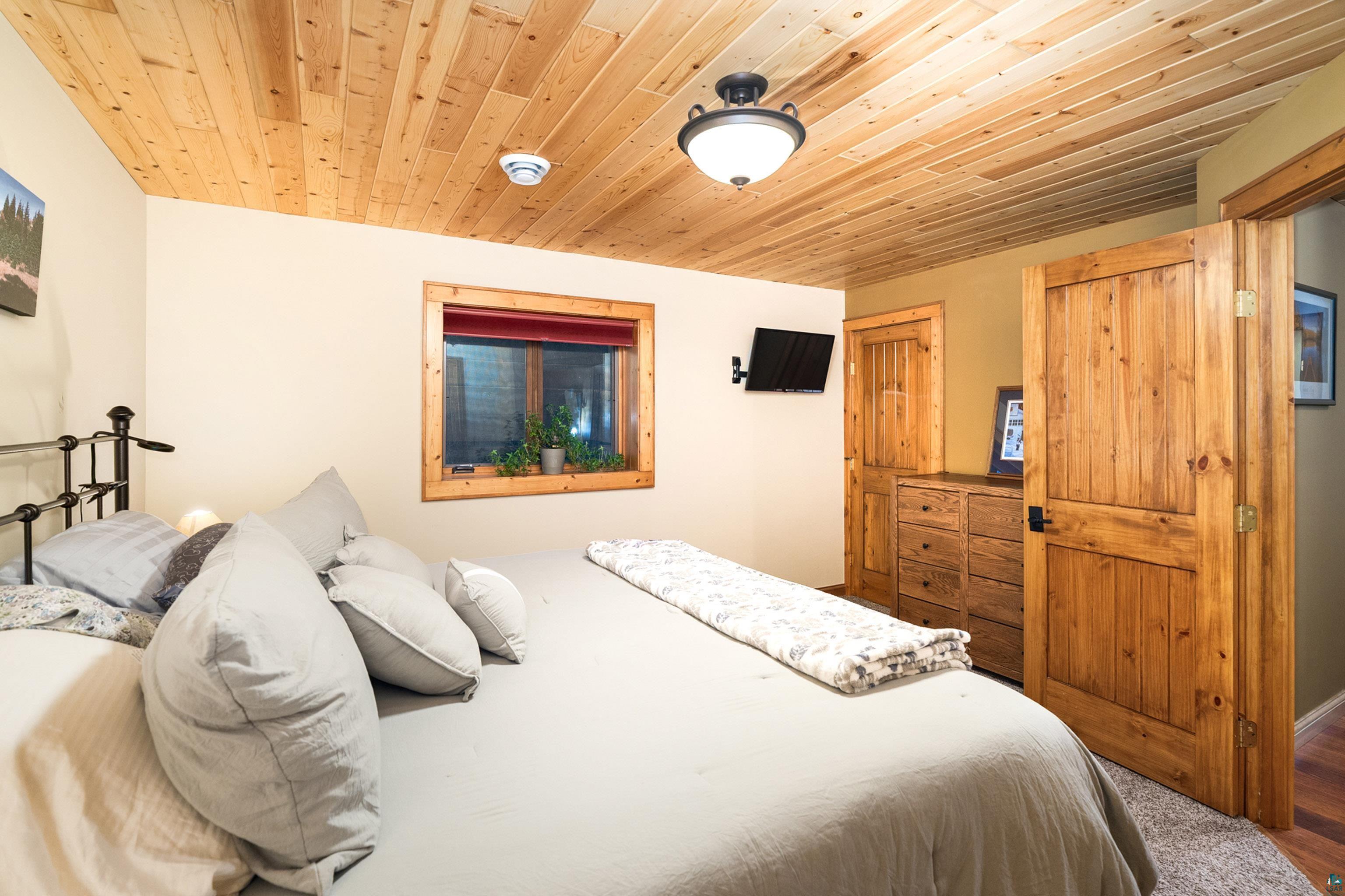 75 East Stark Road Esko, MN 55733 - Photo 41 of 87 Wood-plank ceiling featuring a dome light fixture
