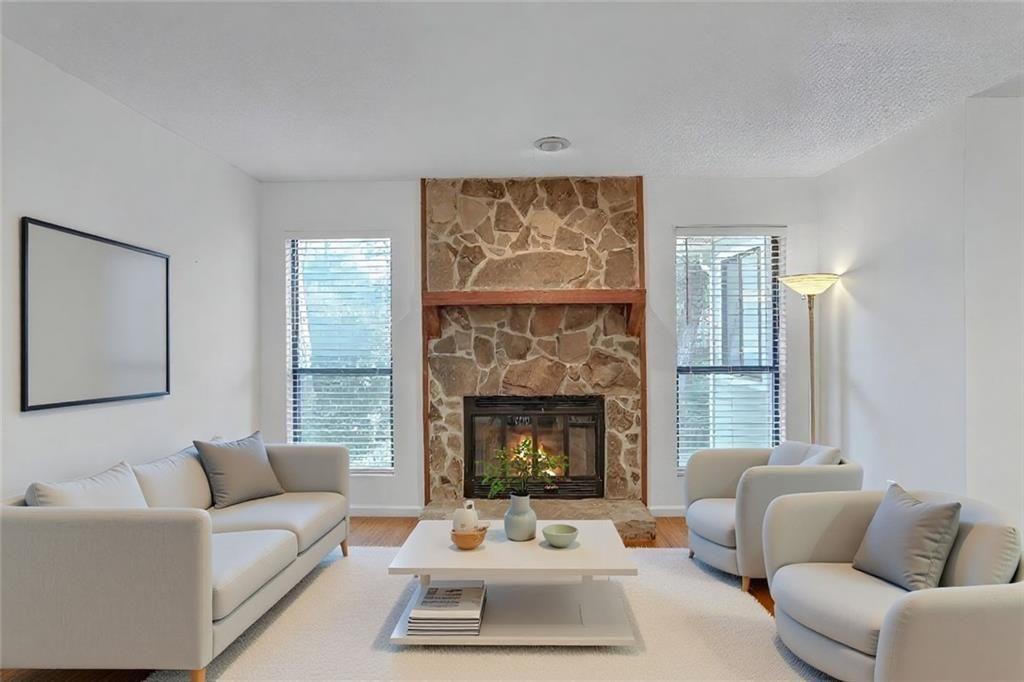 3445 Ivys Walk Atlanta, GA 30340 - Photo 2 of 21 a living room with furniture and a fireplace