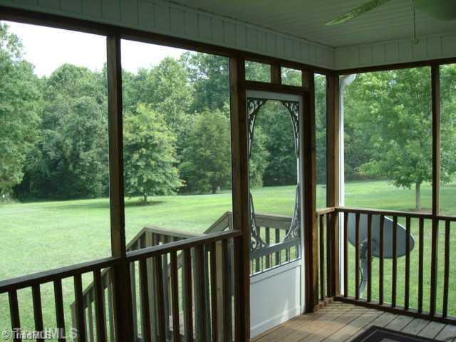 8076 Pritchett Road Browns Summit, NC 27214 - Photo 14 of 16 Screened Porch.