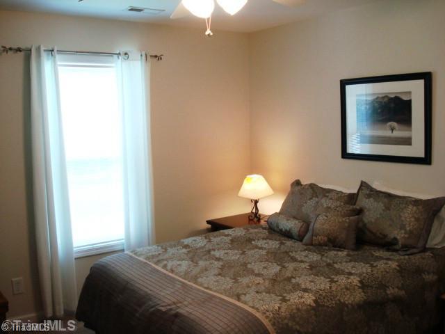 8076 Pritchett Road Browns Summit, NC 27214 - Photo 8 of 16 Master Bedroom.