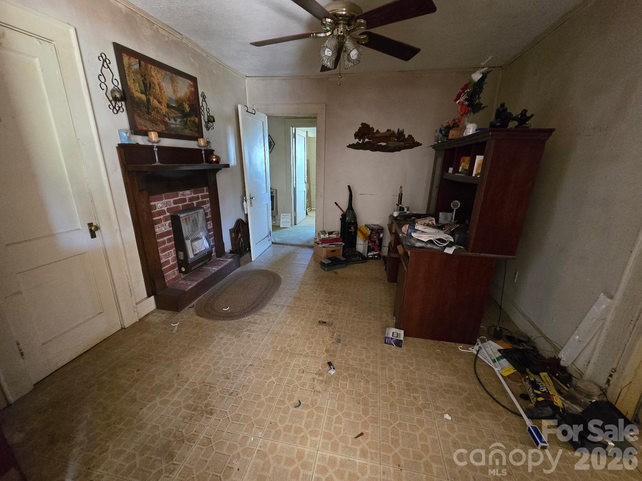 840 Skinner Road Shelby, NC 28152 - Photo 9 of 22 a living room with furniture a flat screen tv and a window