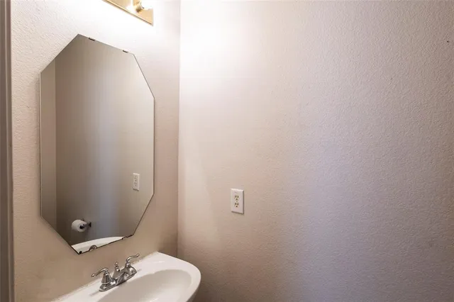 a bathroom with a shower and a shower