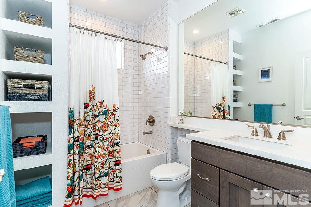 1329 Watt Street Reno, NV 89509 - Photo 15 of 20 a bathroom with a sink toilet and shower