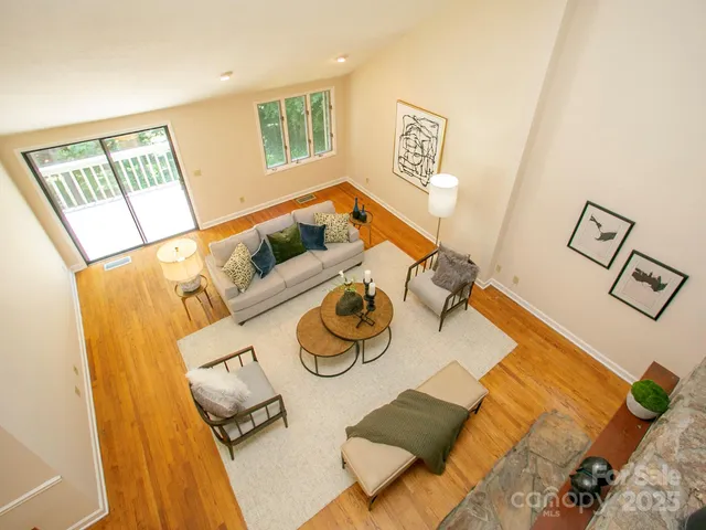 a view of kitchen and dining room with furniture