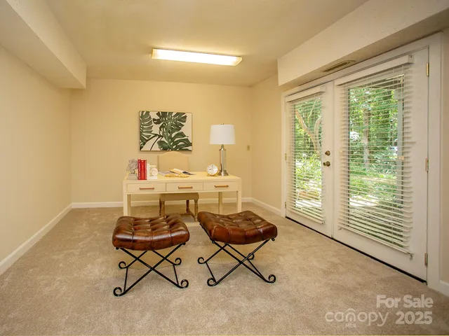 a workspace with furniture and a window