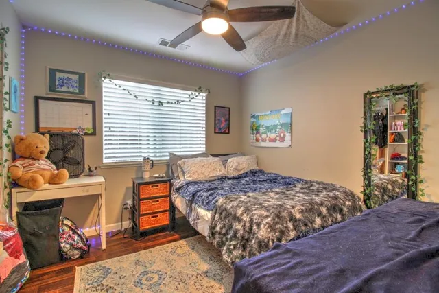 a view of a livingroom with furniture and a window