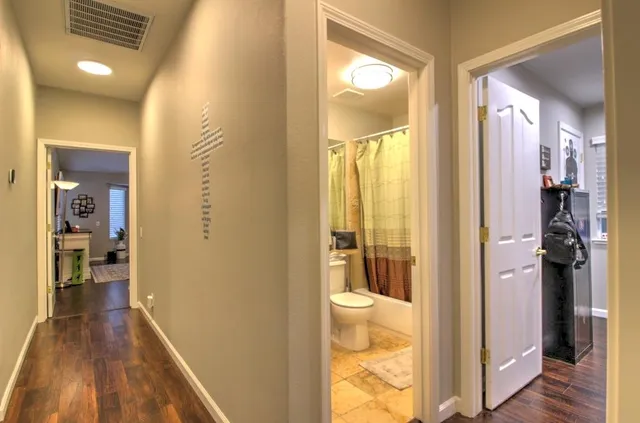 a very nice looking room with furniture and a potted plant