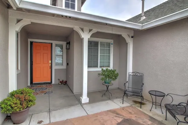 a kitchen with stainless steel appliances granite countertop a stove sink and cabinets