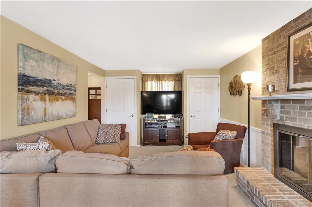 111 Hidden Valley Road Monroeville, PA 15146 - Photo 11 of 25 a living room with furniture and a flat screen tv