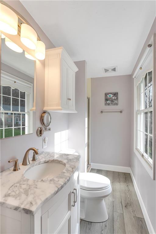 111 Hidden Valley Road Monroeville, PA 15146 - Photo 15 of 25 a bathroom with a granite countertop sink mirror vanity and toilet