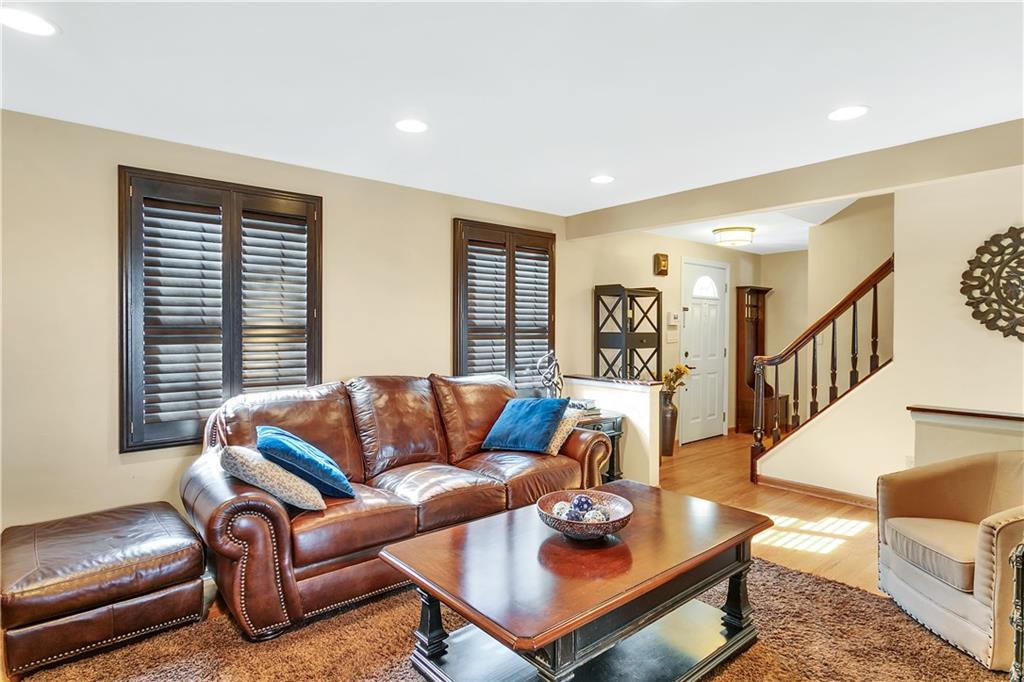 111 Hidden Valley Road Monroeville, PA 15146 - Photo 5 of 25 a living room with furniture a rug and a large window