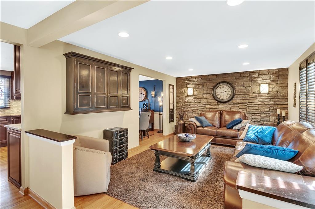 111 Hidden Valley Road Monroeville, PA 15146 - Photo 6 of 25 a living room with furniture and a fireplace