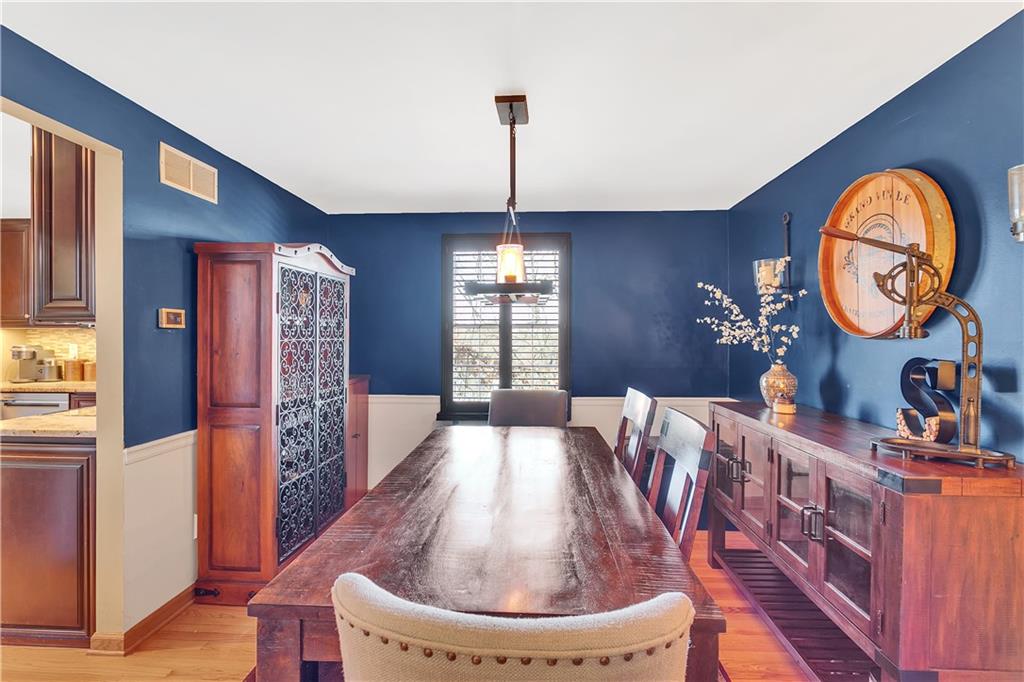 111 Hidden Valley Road Monroeville, PA 15146 - Photo 7 of 25 a view of a dining room with furniture window and wooden floor
