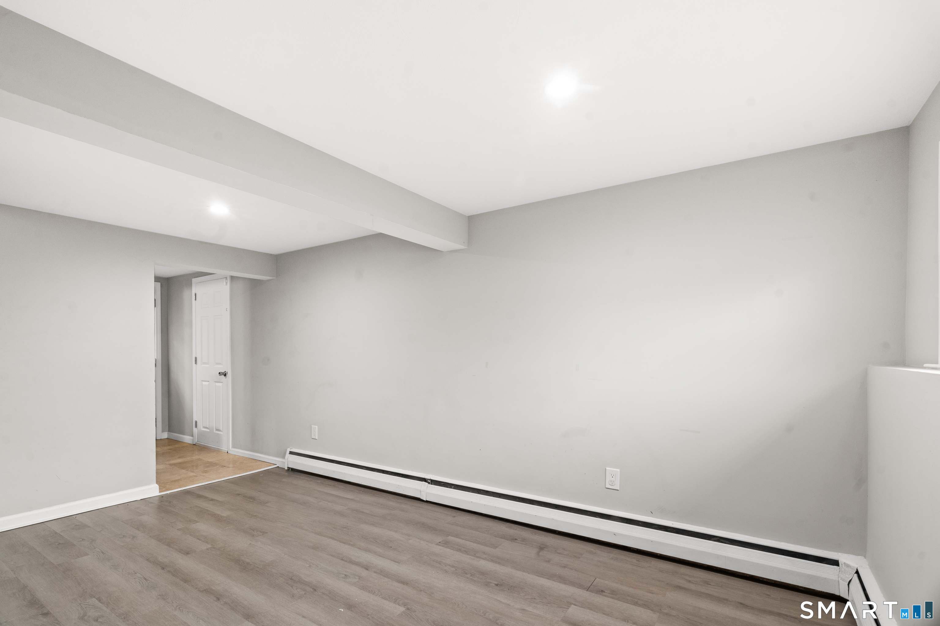 41 Pine Tree Ridge Meriden, CT 06450 - Photo 15 of 16 lower level open space great for additional bedroom/ office/ playroom
