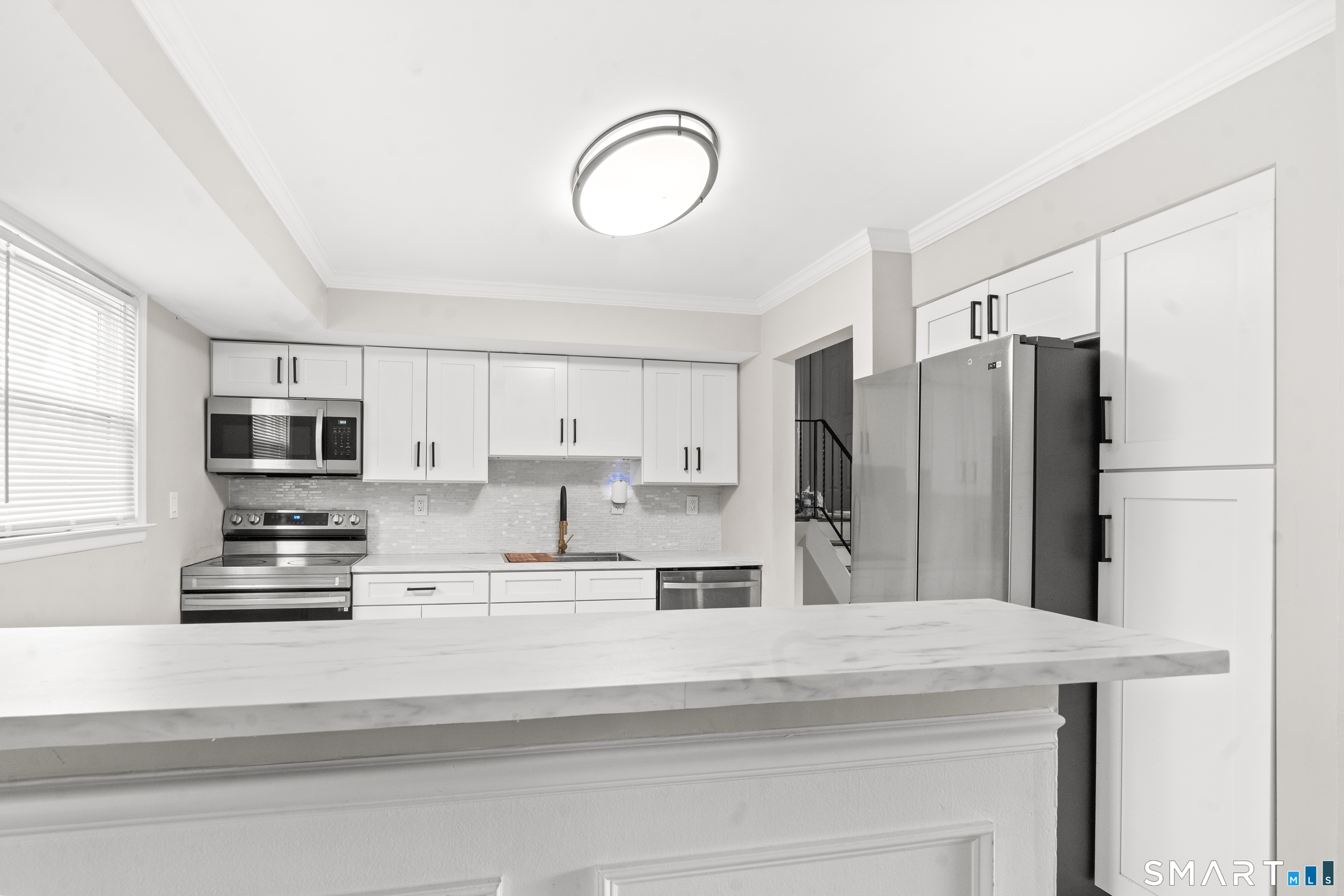 41 Pine Tree Ridge Meriden, CT 06450 - Photo 7 of 16 a view of kitchen from the dining room