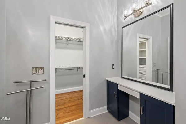 a bathroom with a bathtub and a sink