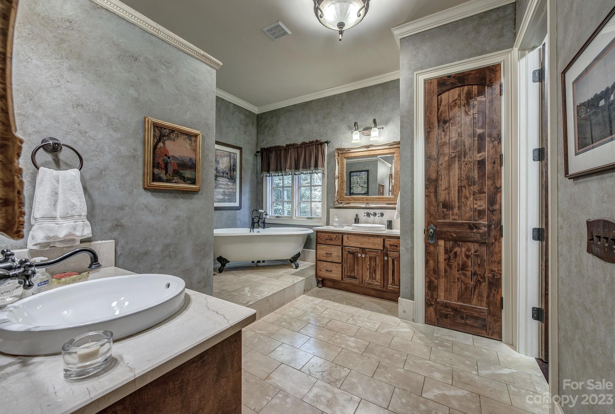 505 Stuart Ridge Cramerton, NC 28032 - Photo 15 of 33 a bathroom with double vanity sink and a mirror