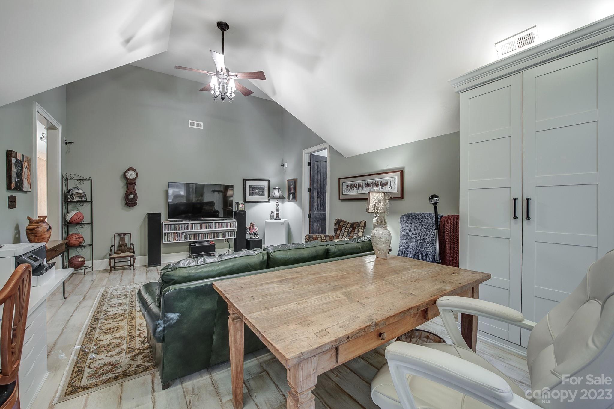 505 Stuart Ridge Cramerton, NC 28032 - Photo 20 of 33 a view of a dining room with furniture