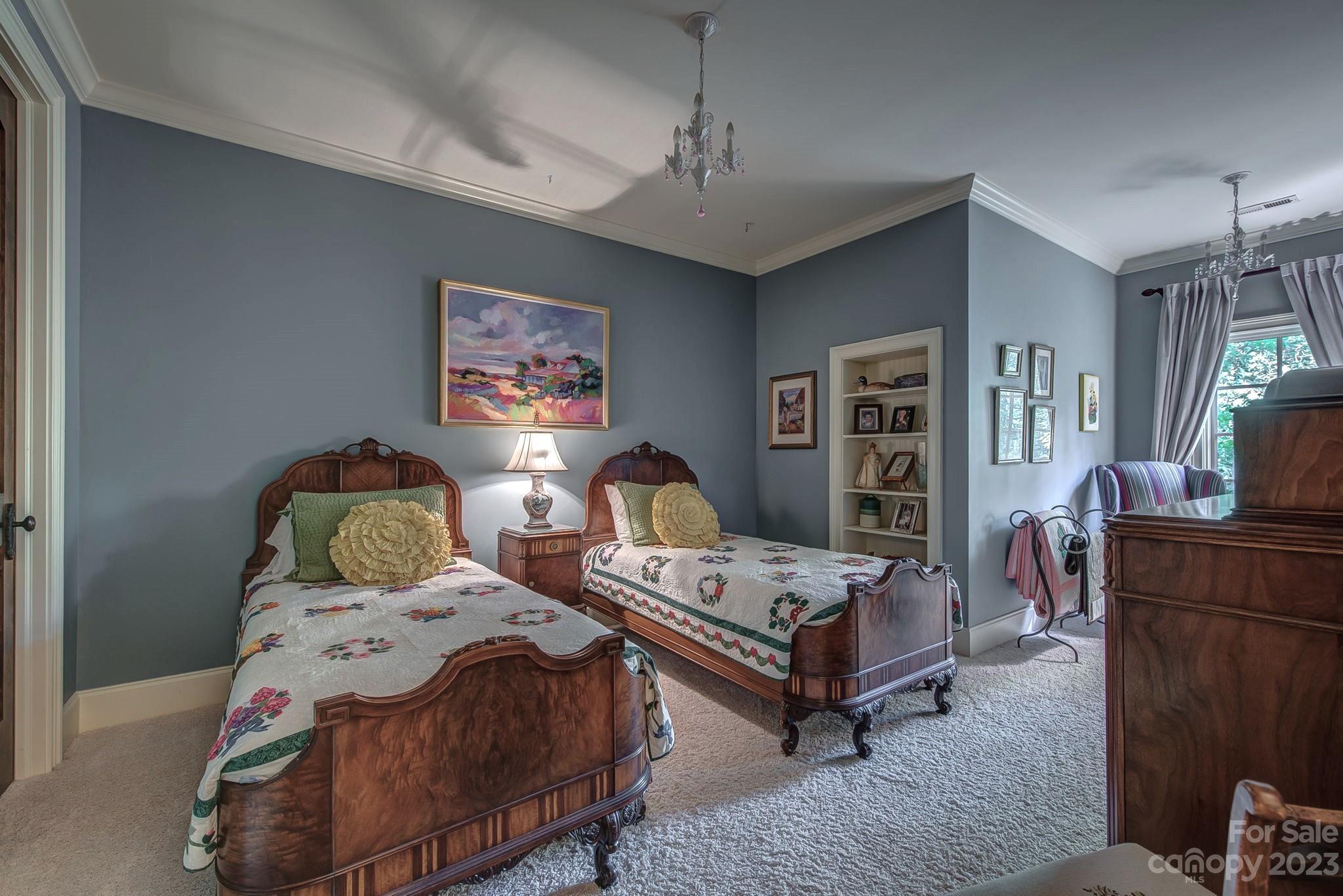 505 Stuart Ridge Cramerton, NC 28032 - Photo 24 of 33 a bedroom with a bed and wooden floor