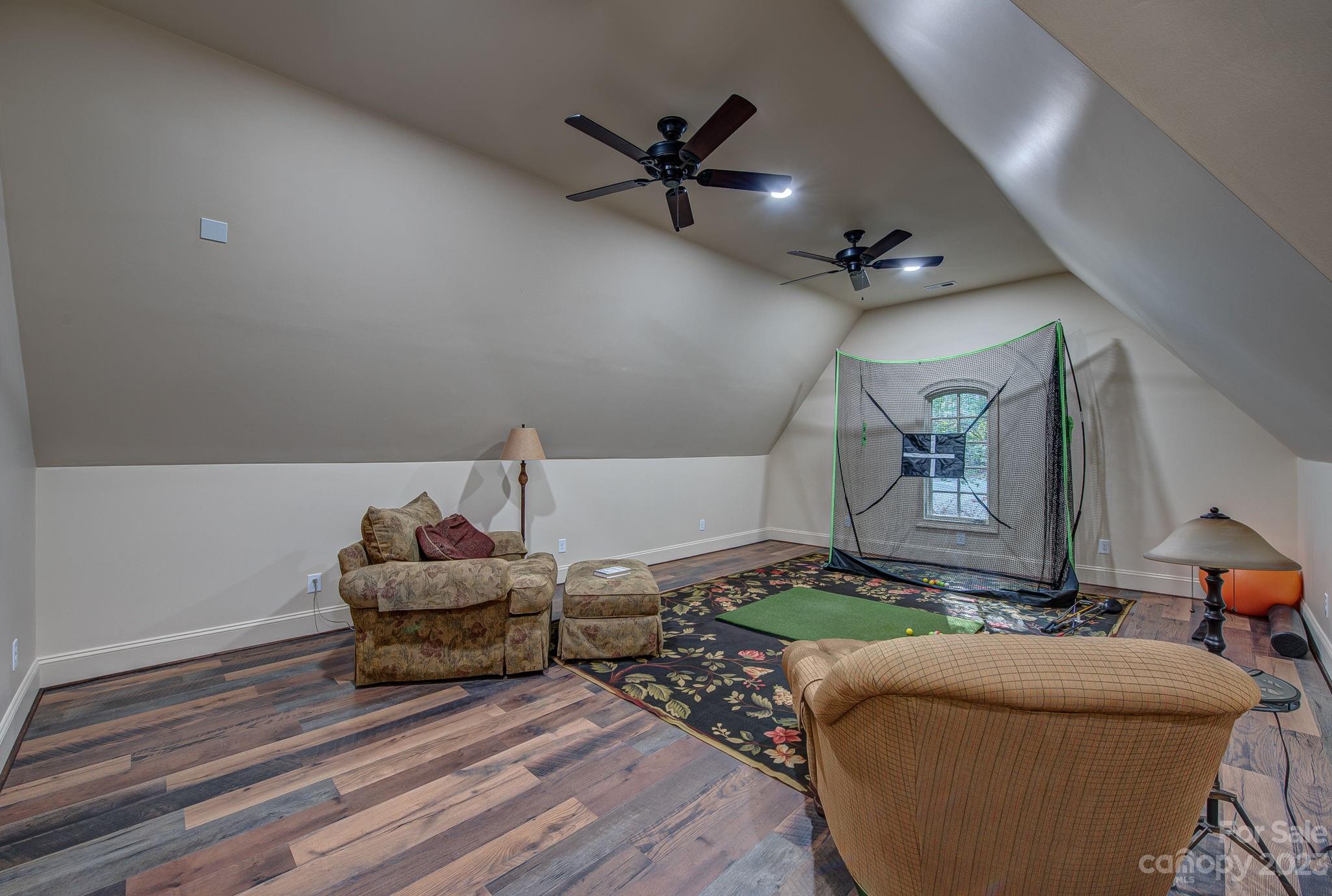 505 Stuart Ridge Cramerton, NC 28032 - Photo 25 of 33 a living room with furniture and a ceiling fan
