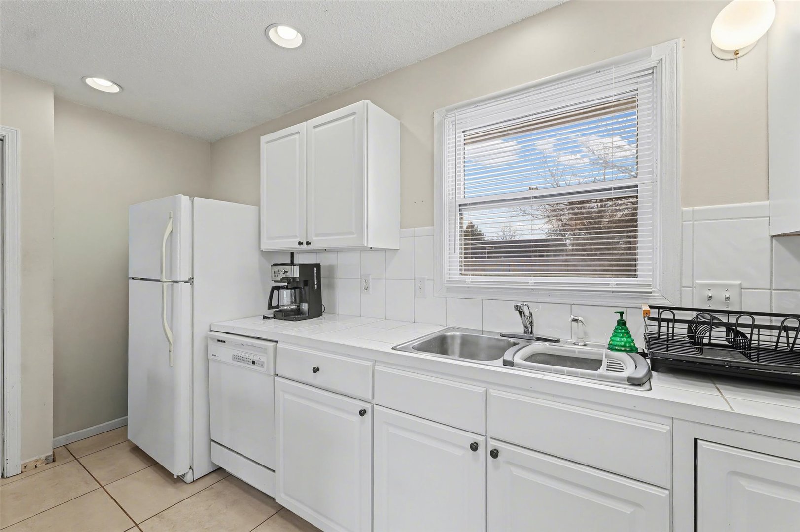 515 Valley View Drive Philo, IL 61864 - Photo 11 of 25 a kitchen with white cabinets and sink
