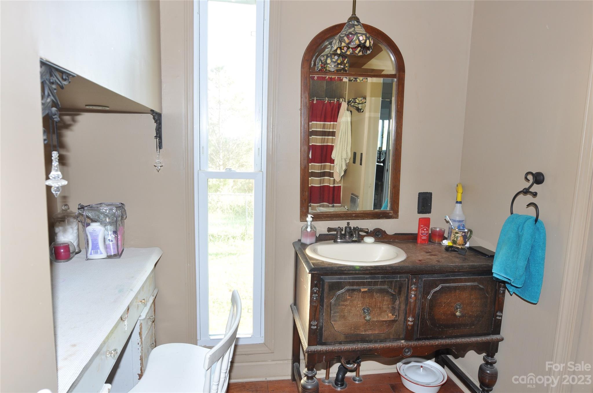 2546 Trussel Road Chester, SC 29706 - Photo 12 of 25 a bathroom with a sink mirror and vanity