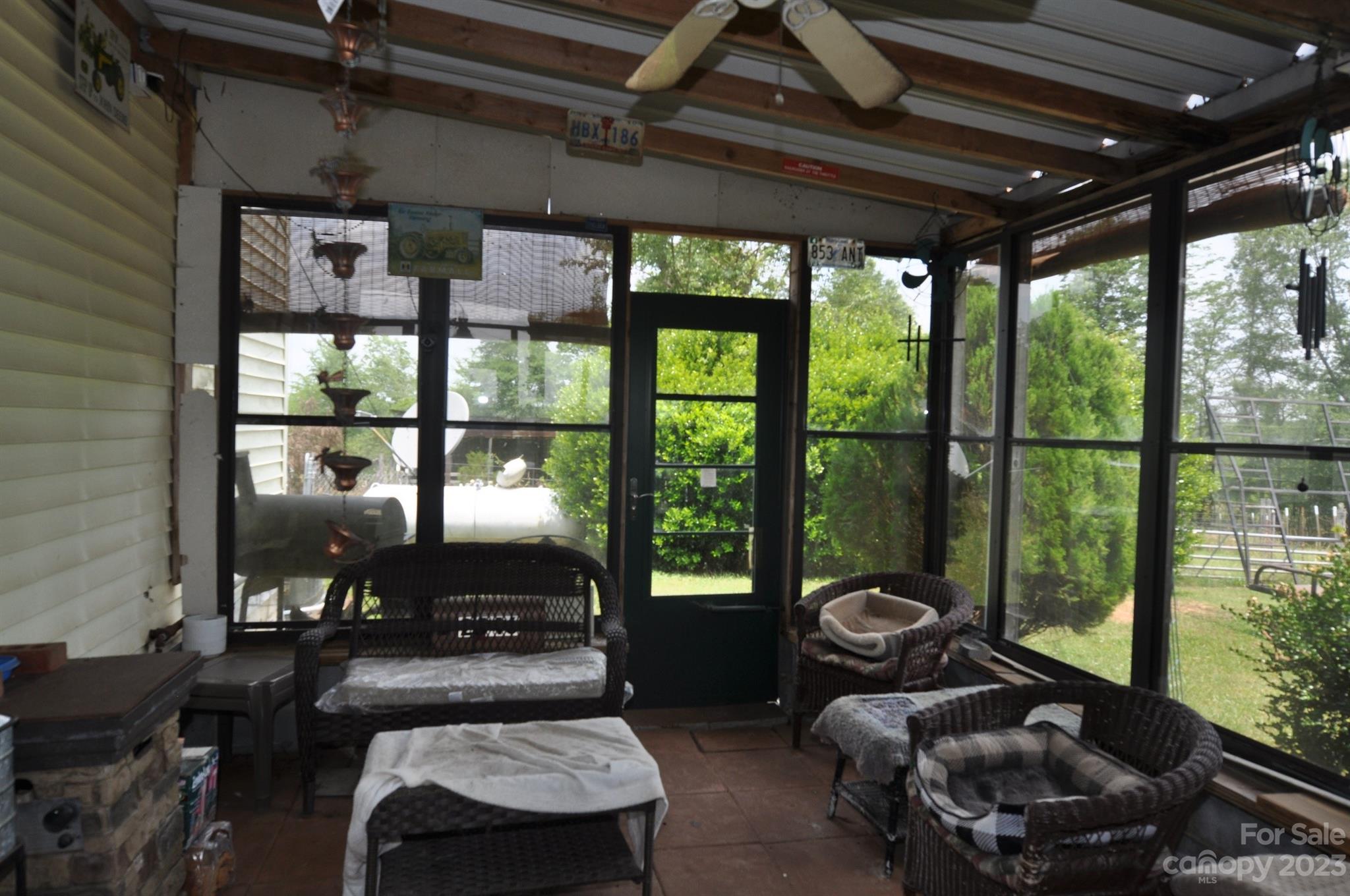 2546 Trussel Road Chester, SC 29706 - Photo 13 of 25 a living room with furniture floor to ceiling window and a table