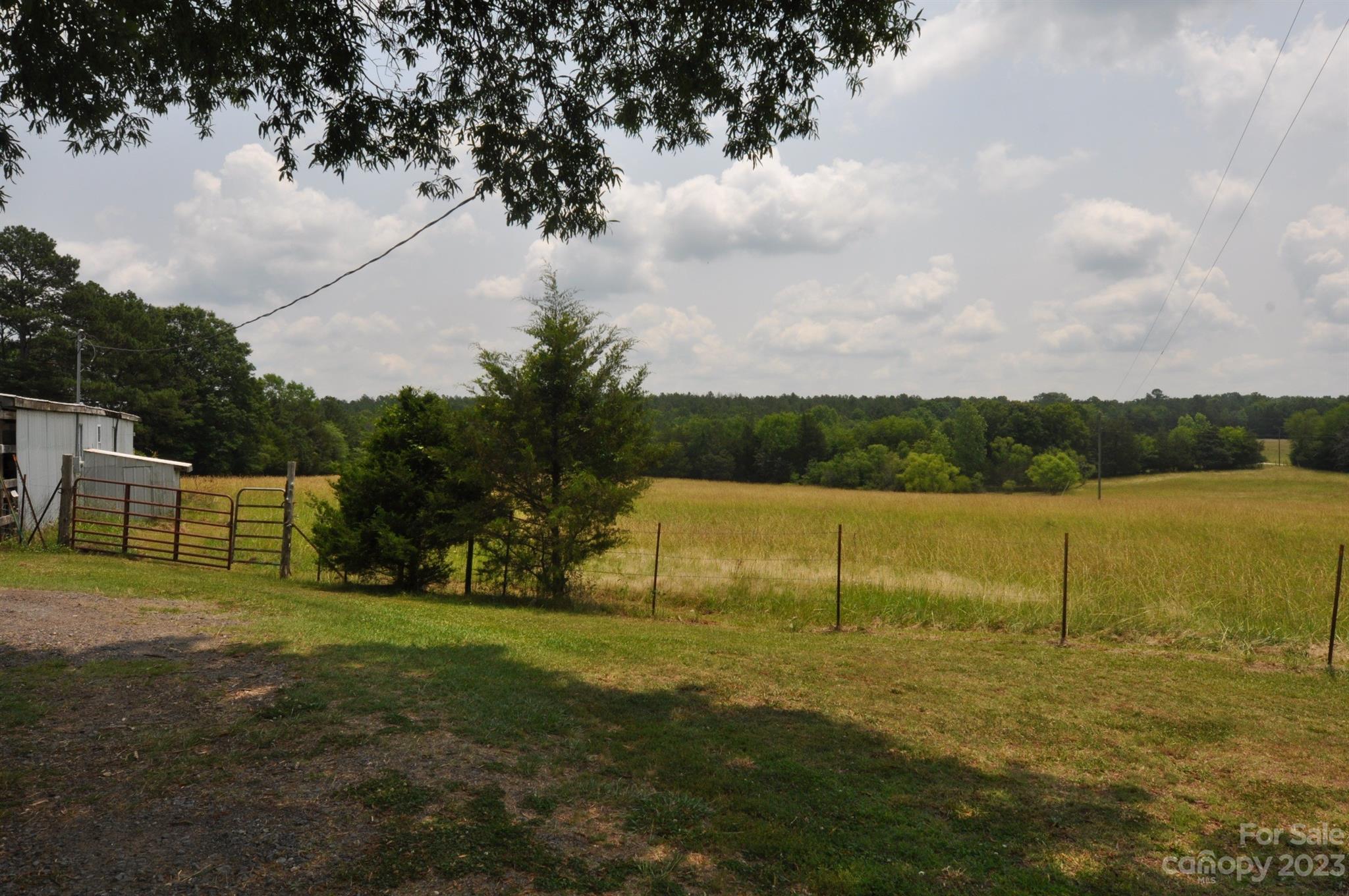 2546 Trussel Road Chester, SC 29706 - Photo 14 of 25 a view of a golf course with a lake