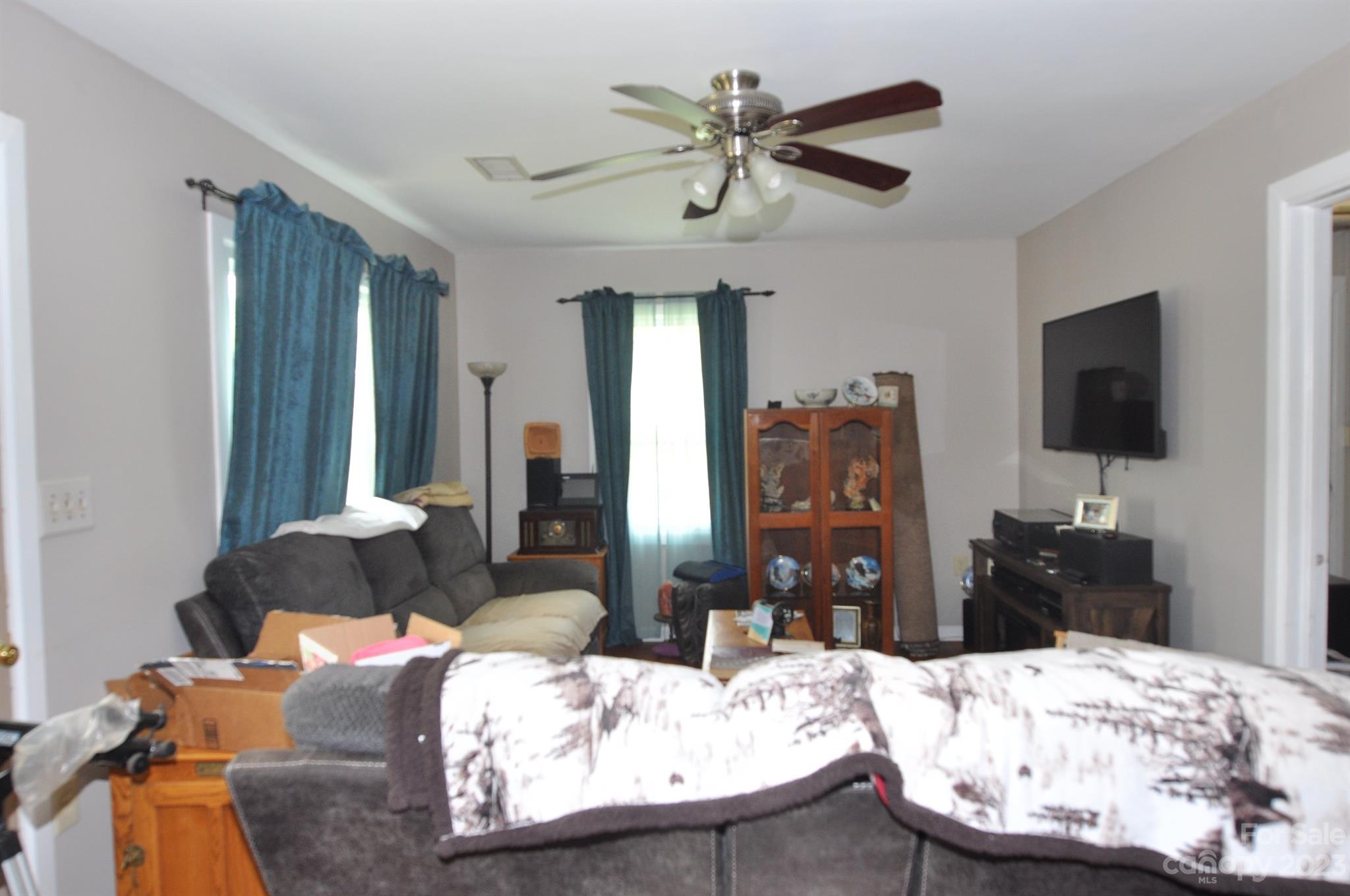 2546 Trussel Road Chester, SC 29706 - Photo 4 of 25 a living room with furniture and a flat screen tv