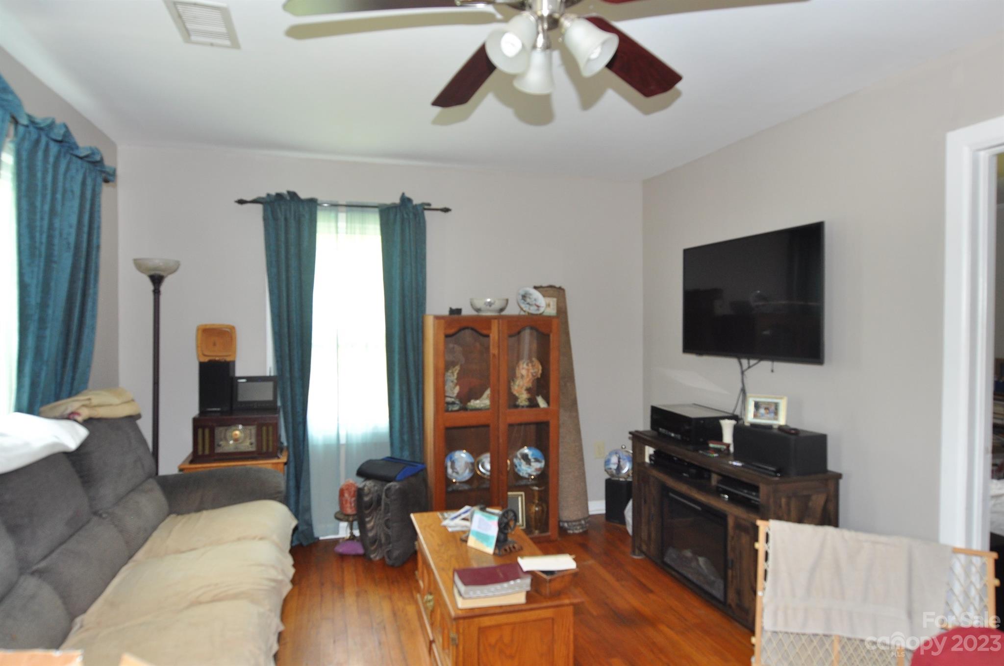 2546 Trussel Road Chester, SC 29706 - Photo 5 of 25 a living room with furniture and a flat screen tv